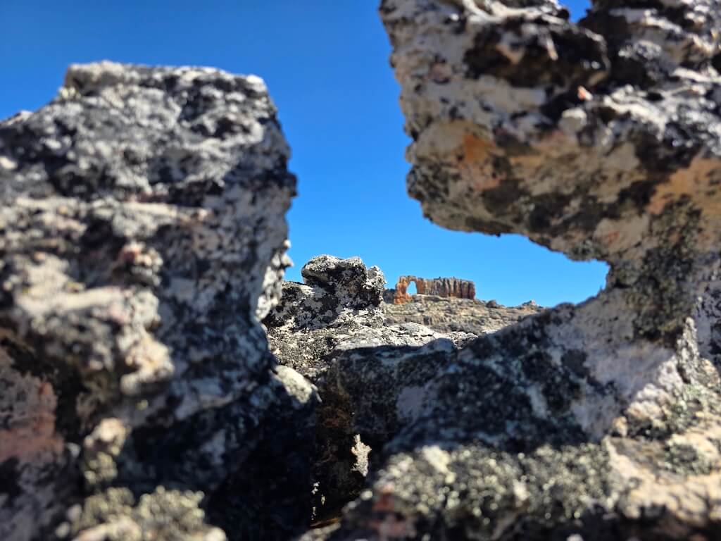 The arch framed in natural rock window